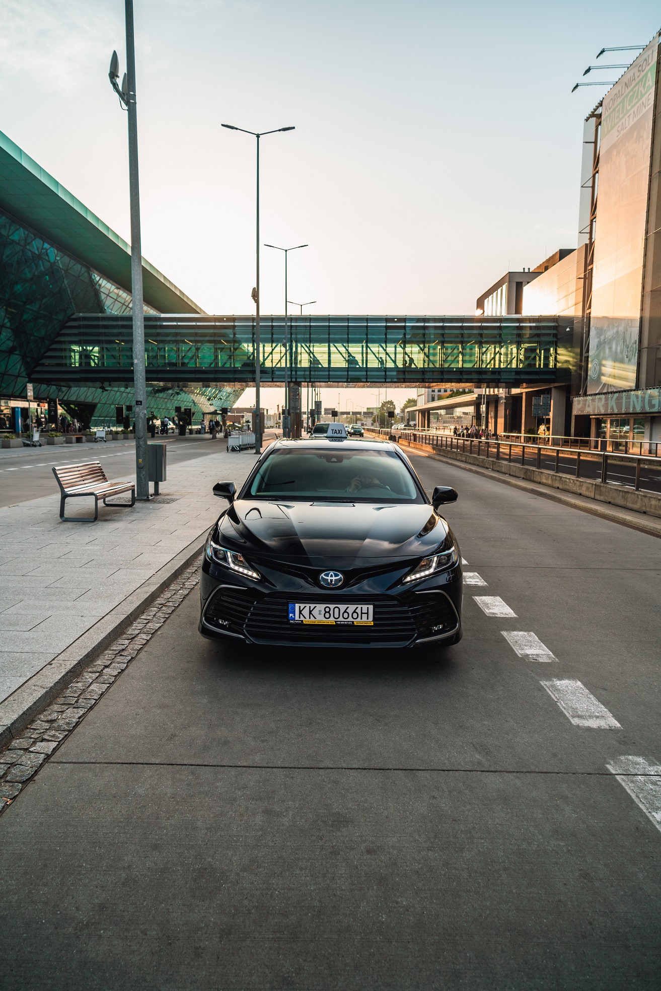 Uber car parked at a city station